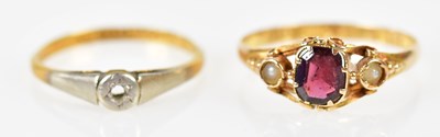 Lot 244 - A 15ct yellow gold garnet and seed pearl ring,...