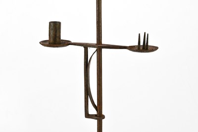 Lot 1621 - A cast iron free standing candle holder,...