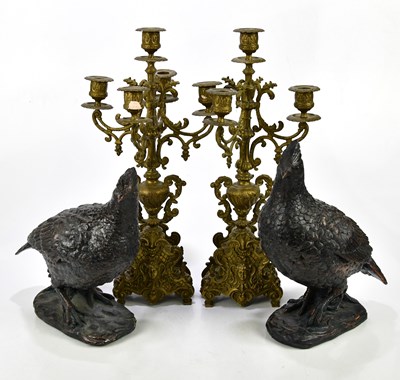 Lot 402 - A pair of cast brass five branch candle...