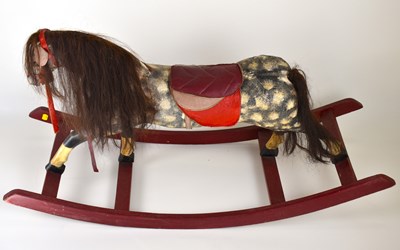 Lot 213 - A vintage rocking horse, height 62cm, length...