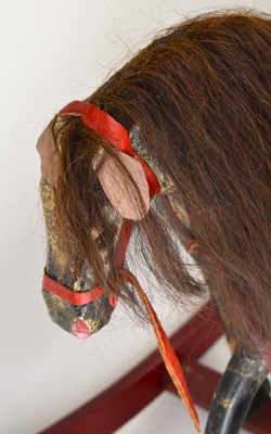 Lot 213 - A vintage rocking horse, height 62cm, length...