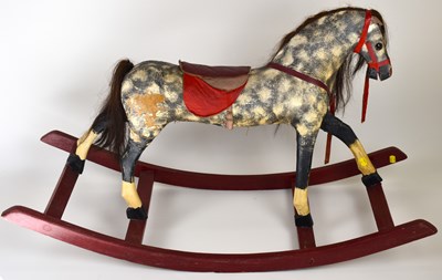 Lot 213 - A vintage rocking horse, height 62cm, length...