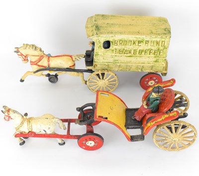 Lot 217 - Two vintage cast iron models, comprising a...