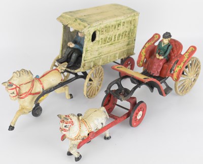 Lot 217 - Two vintage cast iron models, comprising a...