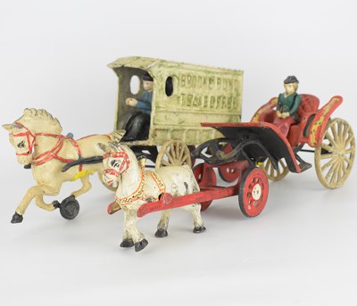 Lot 217 - Two vintage cast iron models, comprising a...