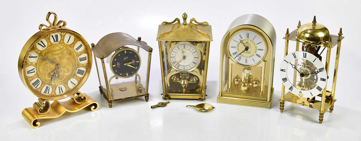 Lot 2306 - A group of five modern brass mantel clocks,...