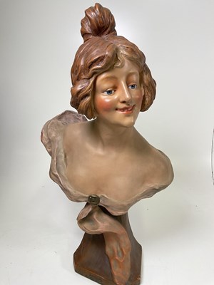 Lot 17 - An early 20th Century Art Nouveau pottery bust...