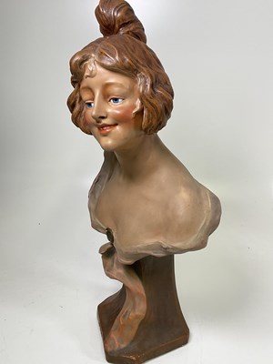 Lot 17 - An early 20th Century Art Nouveau pottery bust...