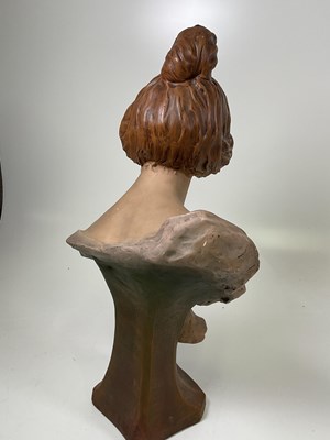 Lot 17 - An early 20th Century Art Nouveau pottery bust...