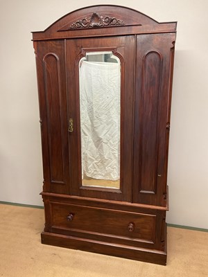 Lot 641 - A mahogany wardrobe with single drawer and...