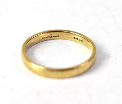 Lot 1052 - A 9ct yellow gold wedding band