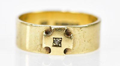 Lot 269 - A 9ct yellow gold ring with raised cross...