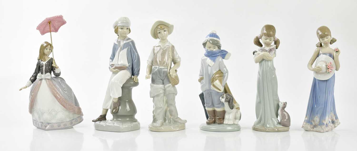 Lot 2182 - LLADRO; six figures to include young boy...