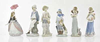 Lot 2182 - LLADRO; six figures to include young boy...