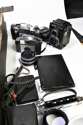 Lot 1562 - A collection of cameras and accessories, to...