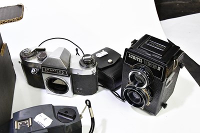 Lot 1562 - A collection of cameras and accessories, to...