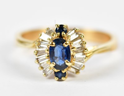 Lot 156 - A yellow metal sapphire and diamond cluster...