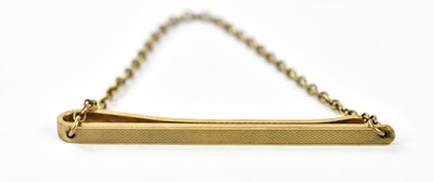 Lot 13 - A 9ct yellow gold tie slide, approx. 9.1g.