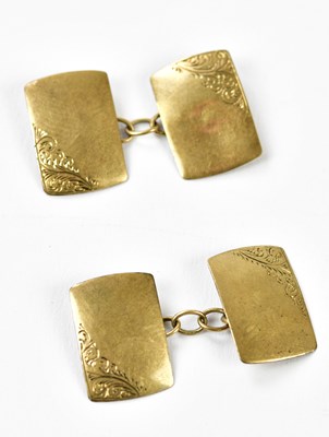 Lot 697 - A pair of 9ct yellow gold cufflinks, approx. 2....