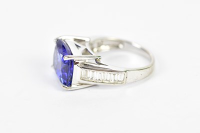 Lot 27 - An 18ct white gold tanzanite and diamond ring,...