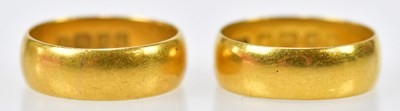 Lot 135 - Two 22ct yellow gold wedding bands, sizes K...