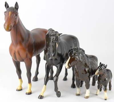 Lot 364 - BESWICK; four model horse figures comprising...