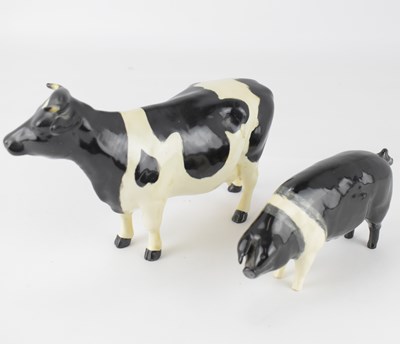 Lot 358 - BESWICK; two porcelain model figures,...