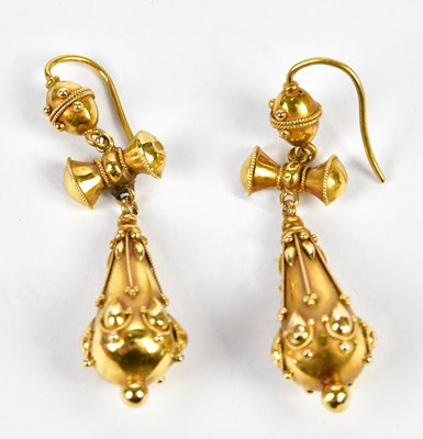 Lot 647 - A pair of Victorian yellow metal drop earrings...