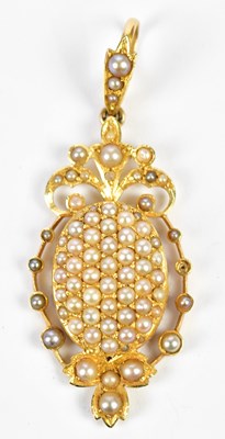 Lot 415 - A 15ct yellow gold and pearl pendant of...