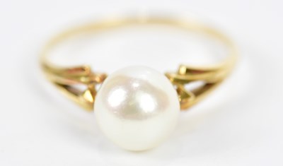 Lot 667 - A yellow metal ring set with cultured pearl,...