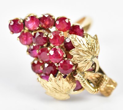 Lot 92 - A yellow metal and ruby ring with later...