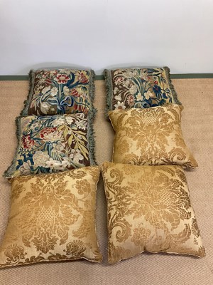 Lot 229 - Three tapestry cushions with fringed trim, and...