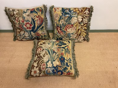 Lot 229 - Three tapestry cushions with fringed trim, and...