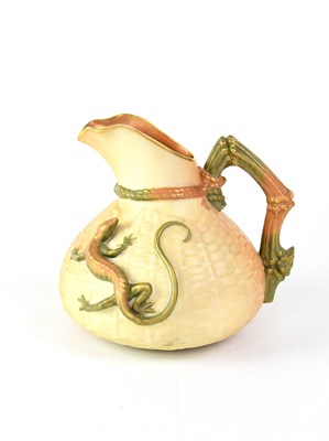 Lot 255 - ROYAL WORCESTER; a blush ware jug of squat...