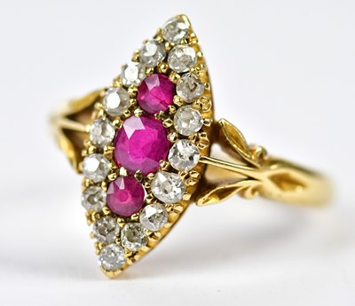 Lot 300 - An 18ct yellow gold diamond and ruby set dress...