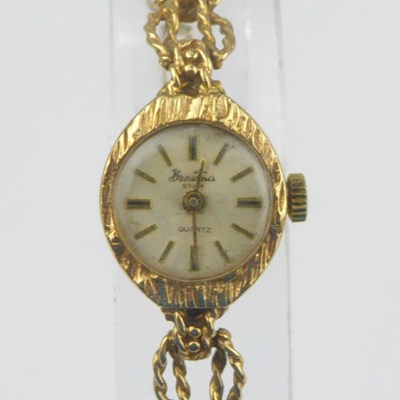 Lot 1056 - BERTINA; a 9ct gold ladies' wristwatch, the...