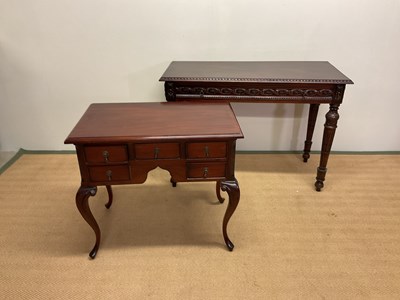Lot 788 - A reproduction hall table with carved detail,...