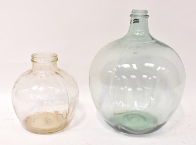 Lot 636 - A green glass carboy, height 55cm, together...