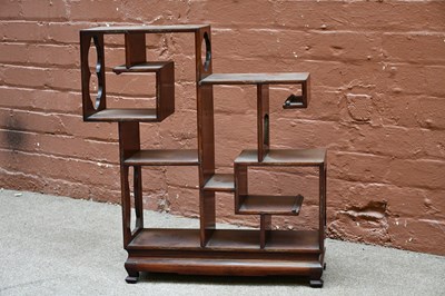 Lot 1122 - A modern Chinese rosewood display stand,...