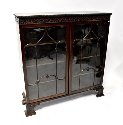 Lot 36 - An Edwardian Chippendale-style mahogany glazed display cabinet