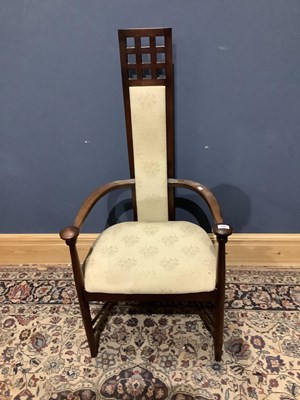 Lot 1067 - An arts & crafts style elbow chair with floral...