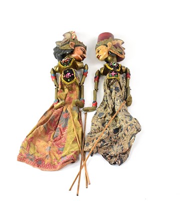 Lot 133 - A pair of Indonesian carved wooden puppets...