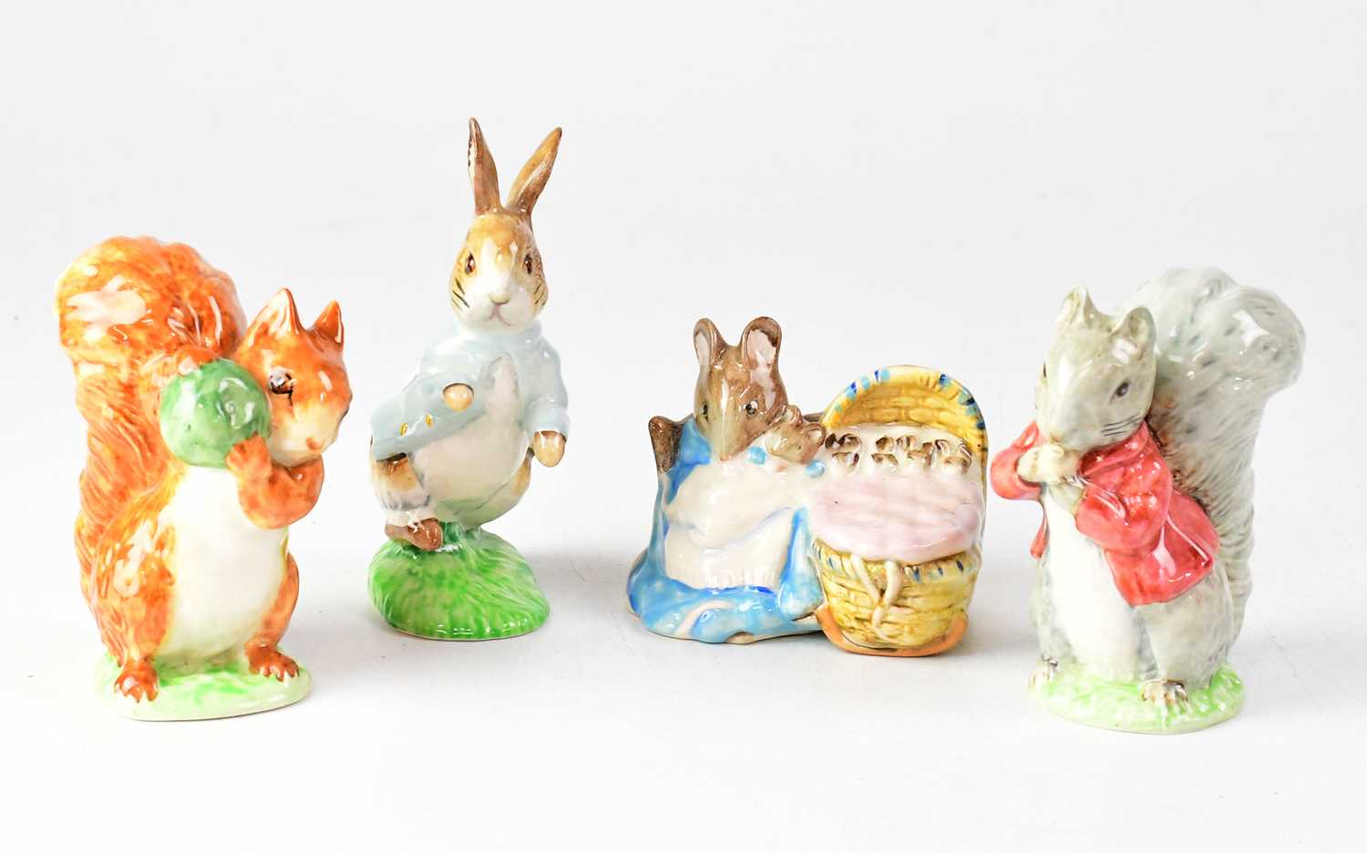 Lot 359 - BESWICK; four Beatrix Potter figures