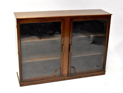Lot 40 - A 1930s mahogany glazed bookcase or display cabinet