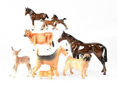 Lot 365 - BESWICK; four models of horses, together with...