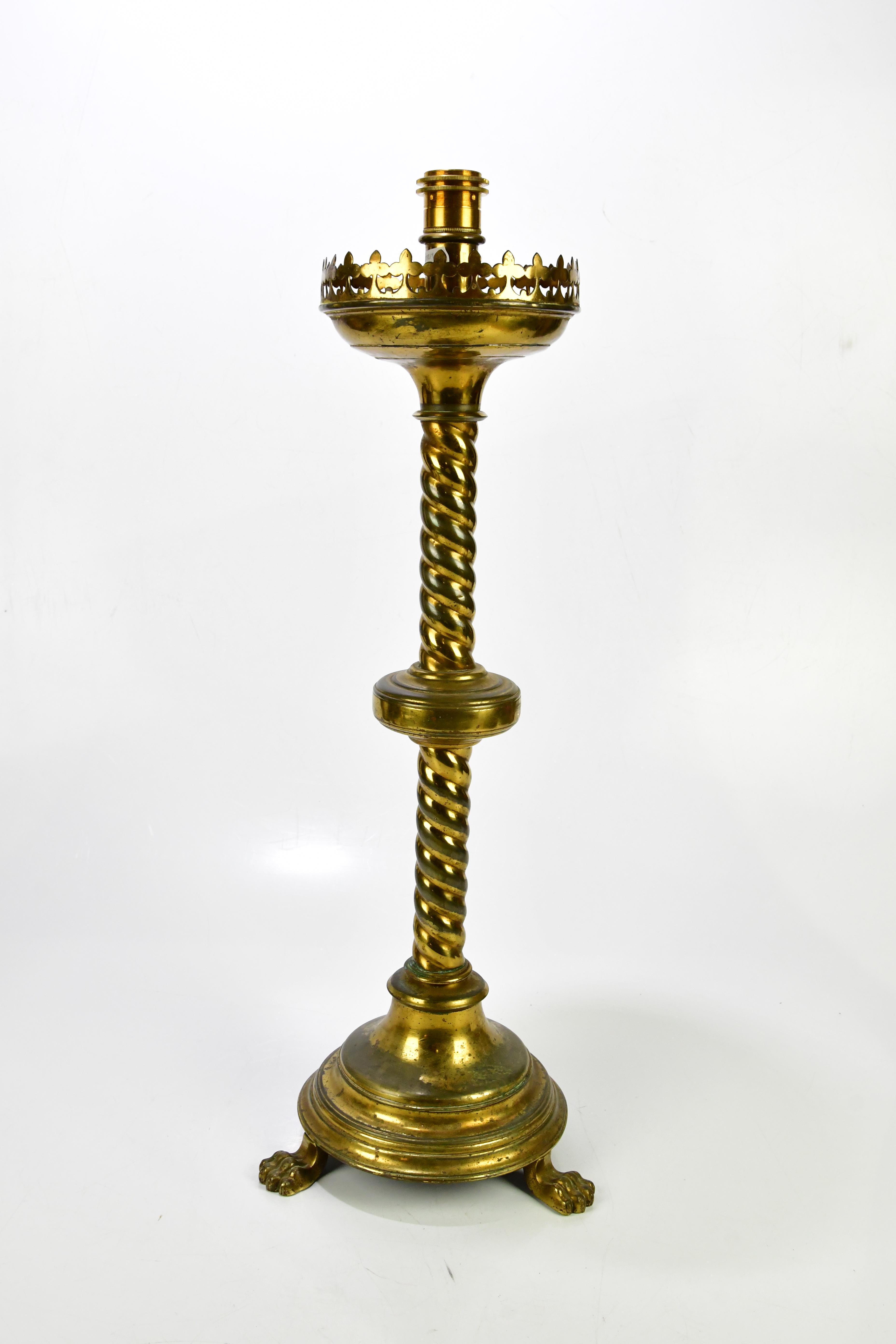Lot 1604 - A Victorian brass altar candlestick