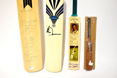 Lot 382 - Four signed cricket bats