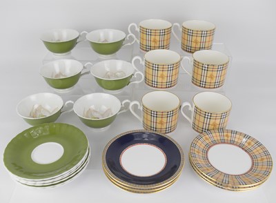 Lot 301 - SUSIE COOPER; a nineteen-piece part tea set in...