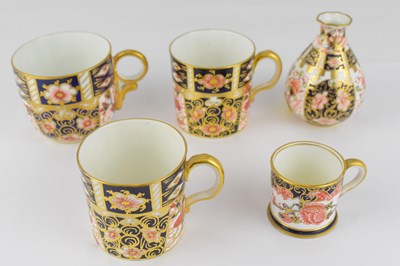 Lot 254 - ROYAL CROWN DERBY; two coffee cans and a...