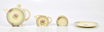 Lot 160 - CLARICE CLIFF; a four piece part tea service...